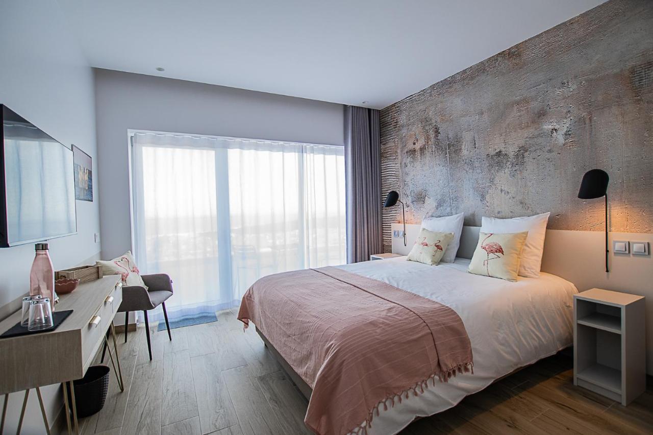 Zimmer mit Queensize-Bett und Meerblick
